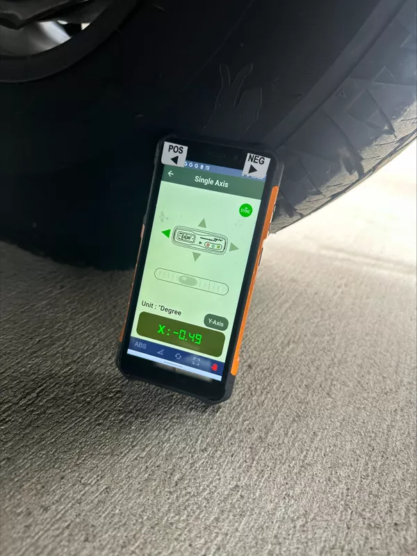 Digital camber reading app used with caravan wheel alignment equipment